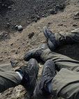 Kiwi Black 6 inch waterproof tactical boots, worn on rocky ground