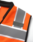Shoulder mic tab on the reflective stripe of the Kiwi Sightline 704 vest